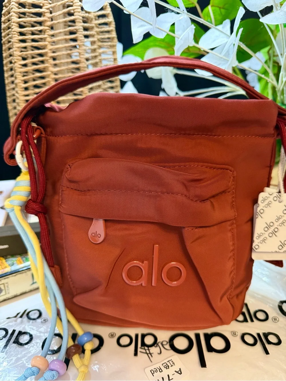 ALO Yoga Burgundy  Drawstring Mini Bucket Bag with Multicolor Cord Tassels
